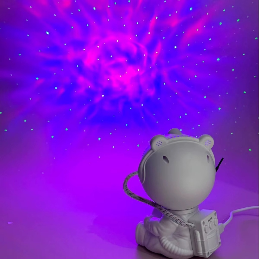 جلاكسي بروجيكتور شكل رجل فضاء ب7 الوان مختلفة للفضاء + ليزر مع ريموت للتحكم