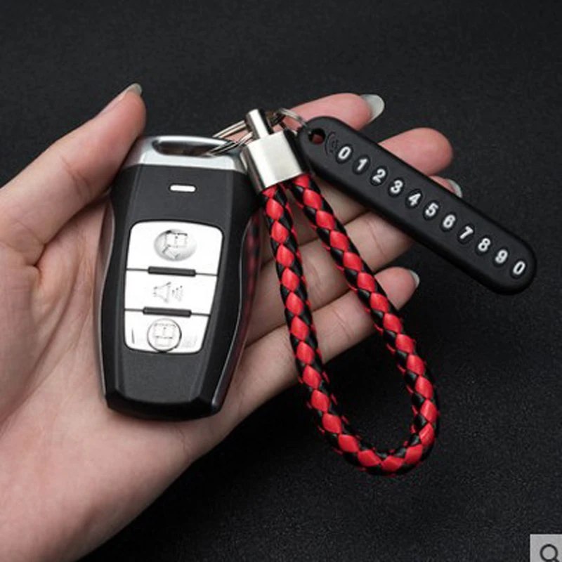 عرض 2 ميدالية مضفرة من الجلد لمفاتيح السيارة والمنزل