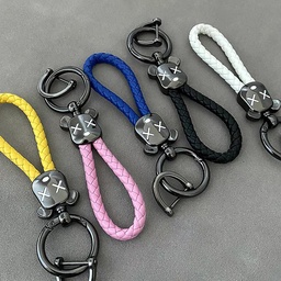 ميدالية جلد مضفر برأس دبدوب لمفاتيح السيارات والشنط مع جزء مخصص لكتابة رقم الموبايل